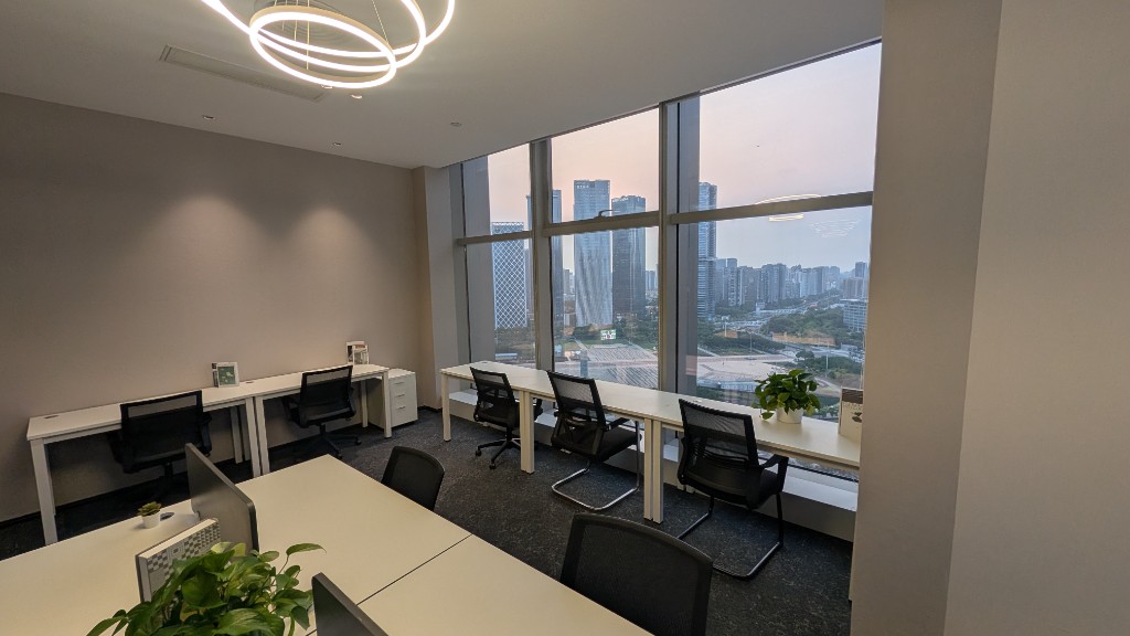New office space in Baoan Center with workstations and city skyline view.
